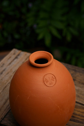 Casa para pájaros de terracota